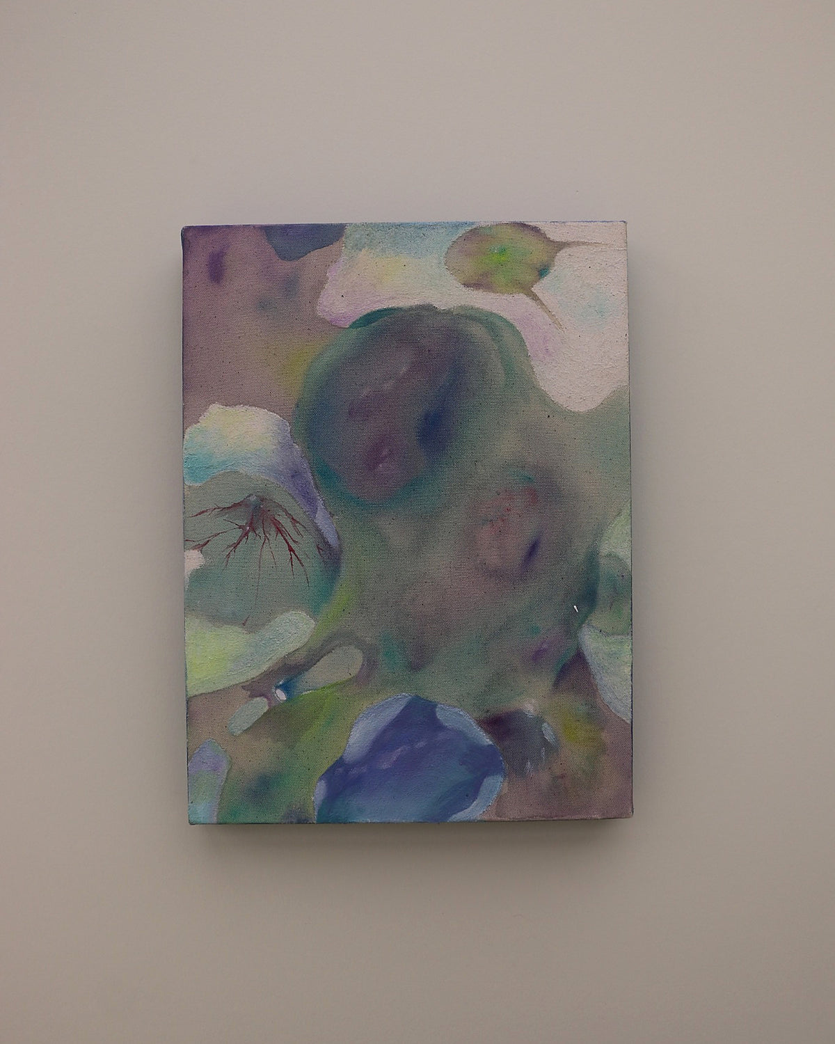 Cheng Chang Beneath the Skin, an abstract painting in muted green, blue, violet and soft pink tones with translucent organic forms, displayed on a neutral wall.